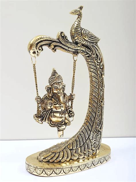 Brass Lord Ganesha on a Peacock-Design Swing 9 inches – AONA INDIA