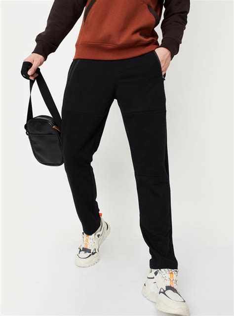 Buy Men Ribbed Athleisure Track Pants Online at just Rs. 999.0 ...