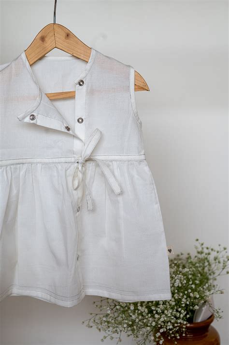 'Precious and pure' girls jhabla in white organic cotton – Love the ...