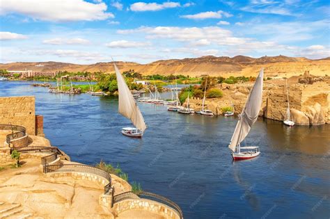 The nile river scenery and traditional sailboats aswan egypt | Premium ...