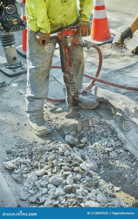 A Day Laborer Positions a Jackhammer before he Starts. Stock Image ...