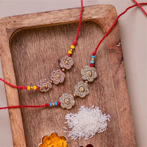 Buy Handmade Crochet Golden Floral Rakhi With Roli Chawal | Set Of 2 ...
