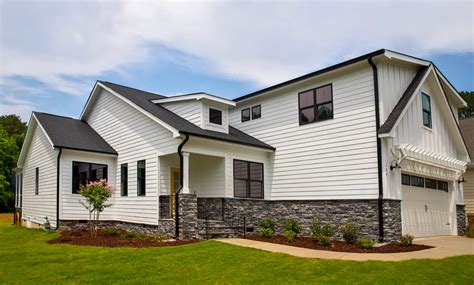 Beautiful stone veneer in two color options incorporated throughout ...