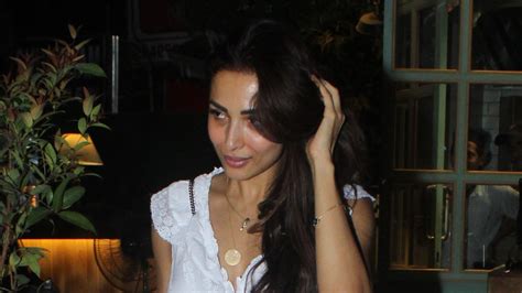 Malaika Arora wears a white maxi dress with sling bag in Mumbai | Vogue ...