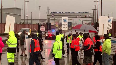 Port workers strike after wage proposal 'falls short' of union demands