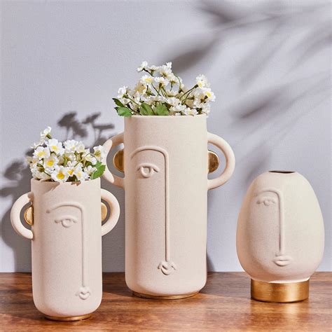 Buy Marshmallow Ceramic Human Face Vase from Home Centre at just INR 1299.0
