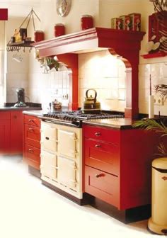 red cabinets and white AGA Aga Kitchen, Country Farmhouse