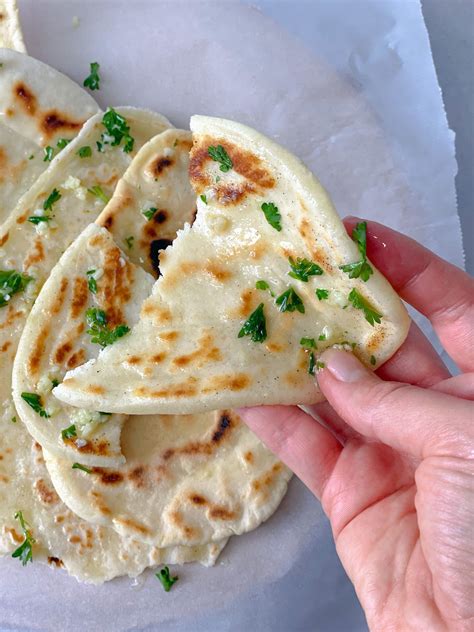 Soft, puffy naan bread with beautiful brown blisters just like ...
