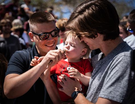 Baby Kissing a Razorback Sucker | FWS.gov