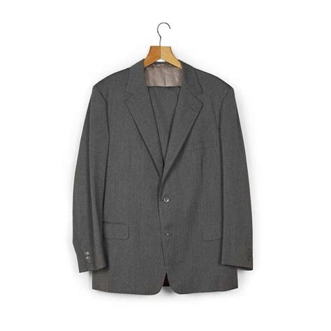 Suits worn by Sir Sean Connery on screen fetch almost £7,000 in auction ...