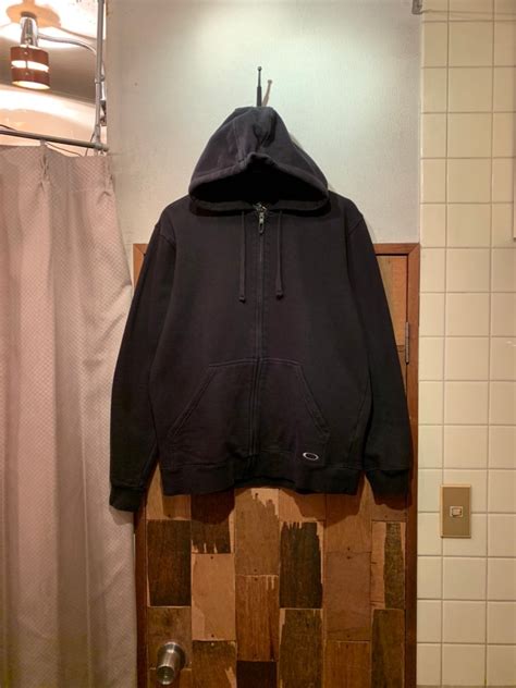 “OAKLEY” black cotton/poly logo design zip-up parka | LAUGH