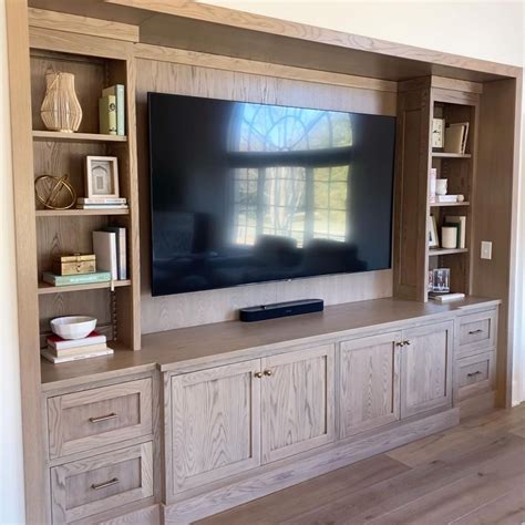 Entertainment Center with Built-in Cabinets and Flat Screen TV