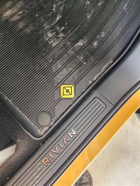 All weather floor mats logos are black | Rivian Forum - R1T R1S R2 R3 ...
