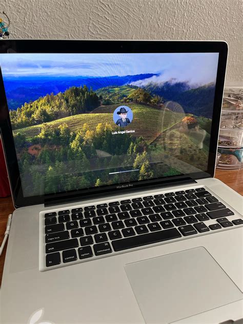MacBook Pro stuck on loading screen after updating to macOS Sonoma 14.4 ...