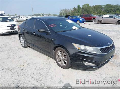 Report 5XXGN4A77CG034457 KIA OPTIMA 2012 Black Gasoline - price and damage history