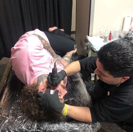 Rapper Post Malone gets a new face tattoo