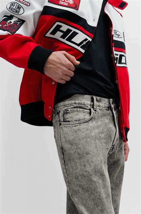 HUGO - Loose-fit jeans in bleach-wash black rigid denim - Grey