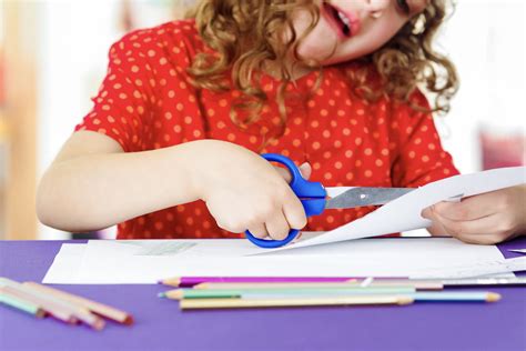 Image result for Child Using Scissors