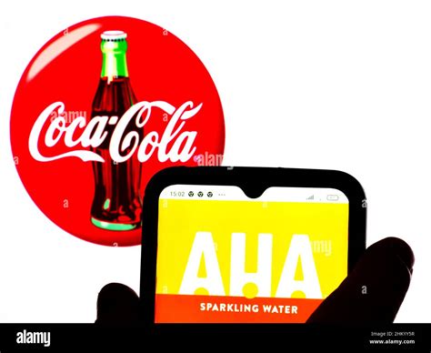 In this photo illustration, the AHA, carbonated water logo is displayed ...