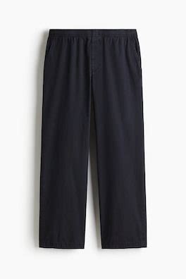 Relaxed Fit Cotton trousers - Dark blue - Men | H&M IN