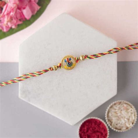 eCraftIndia Colorful Religious Lord Ganesha Rakhi with Red, Green, Yel