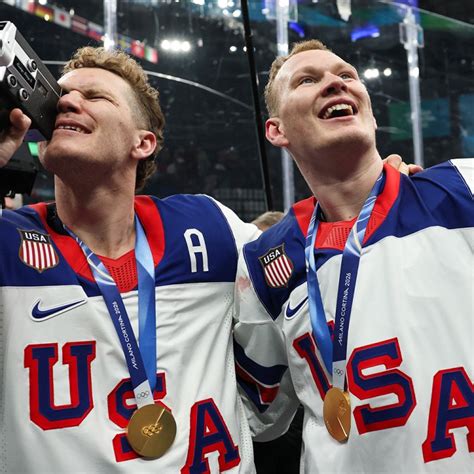 The United States Olympic men's hockey team, with Matthew Tkachuk and Connor Hellebuyck in front, react as President Donald Trump delivers his State of the Union address on February 24, 2026.