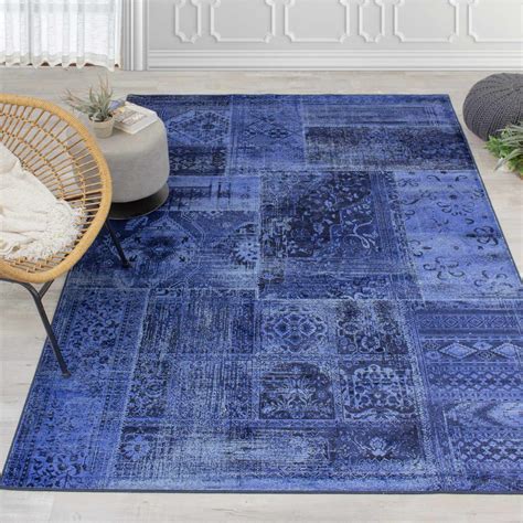 Antika Brilliant Navy Patchwork Floor Cloth Rug by Kalora