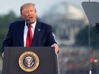 Trump's postmaster general pauses service cuts after mail-in ballots ...