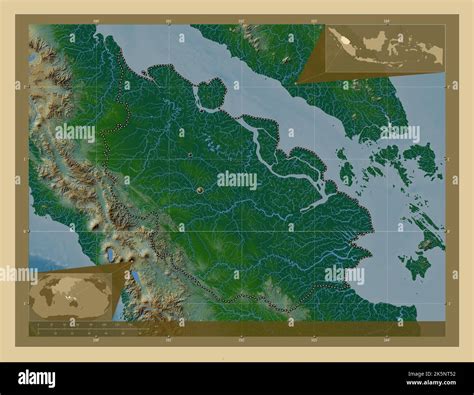 Riau, province of Indonesia. Colored elevation map with lakes and rivers. Locations of major ...