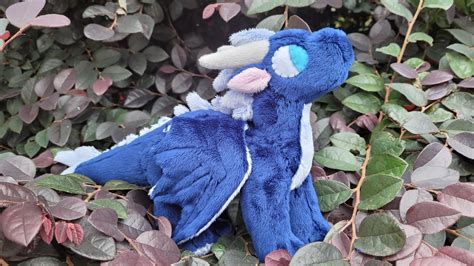It’s Whiteout as a plushie! I love her, she’s the best dragon (apart from Turtle) : r/WingsOfFire
