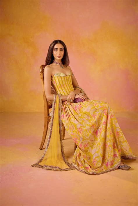 Anaya Yellow Sequinned Corset Muslin Lehenga Set