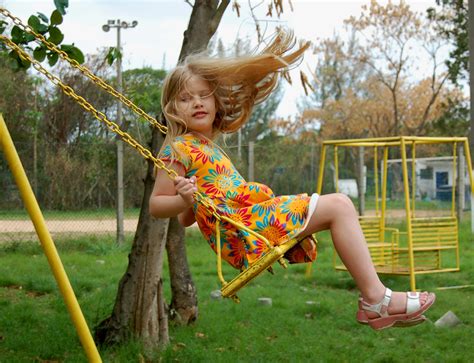 File:Little girl on swing.jpg - Simple English Wikipedia, the free ...