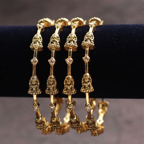 Antique Nagas Diamond Look AD Lakshmi Set of 4 Bangles