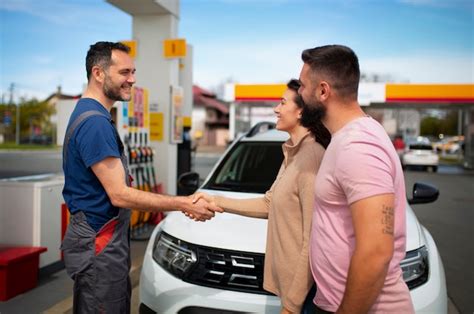 People spending time at the gas station | Premium Photo
