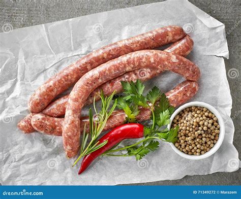 Fresh raw meat sausages stock photo. Image of cuisine - 71349272