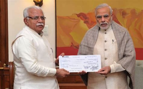 Haryana CM presents draft worth Rs 5 crore to PM, for PMNRF