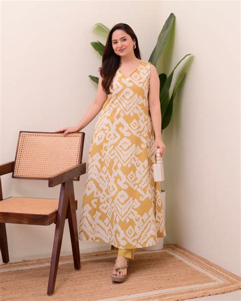 Mustard Yellow 2 PC Pure Cotton Ikat Print A Line Kurta Set For Women ...