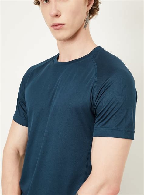 Buy Men Slim Fit Solid Athleisure T-shirt Online at just Rs. 399.0 ...
