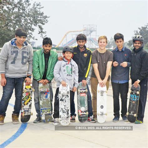 Eager young skateboarders with trainer Steve (R) during a skateboarding ...