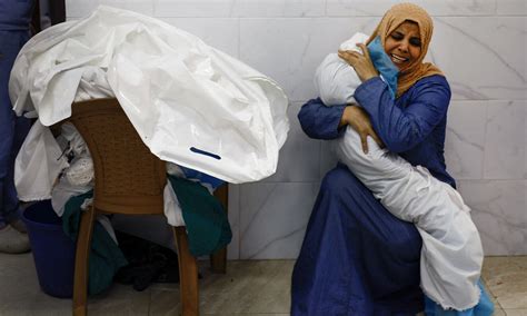 In pictures: Grief in Gaza and the loss of a child