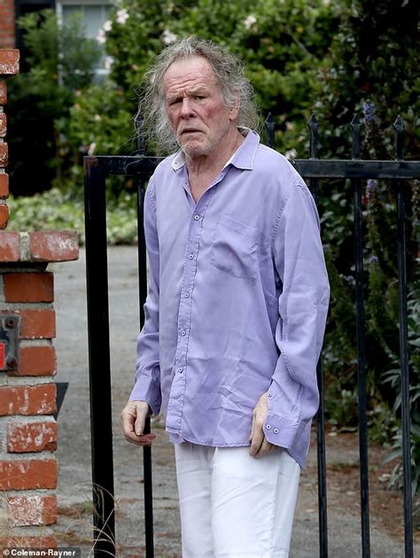 Actor Nick Nolte, 83, evokes his notorious wild-haired 2002 mugshot as ...