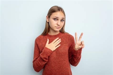 Taking an oath putting hand on chest | Premium Photo