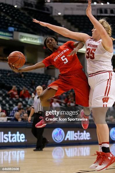 Rutgers forward Nicole Skelly looks to get her shot around Wisconsin ...