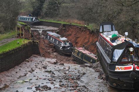 Stretch of canal dammed off in UK after sinkhole leaves 10 needing ...