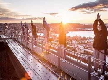 Sydney Harbour Bridge climbers celebrate International Yoga Day