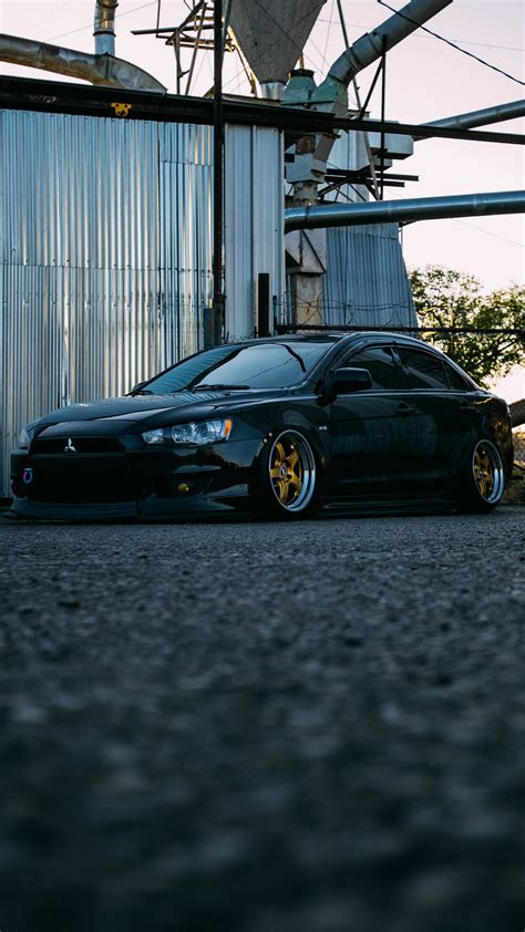 Download wallpaper 1350x2400 mitsubishi, lancer, black, side view ...