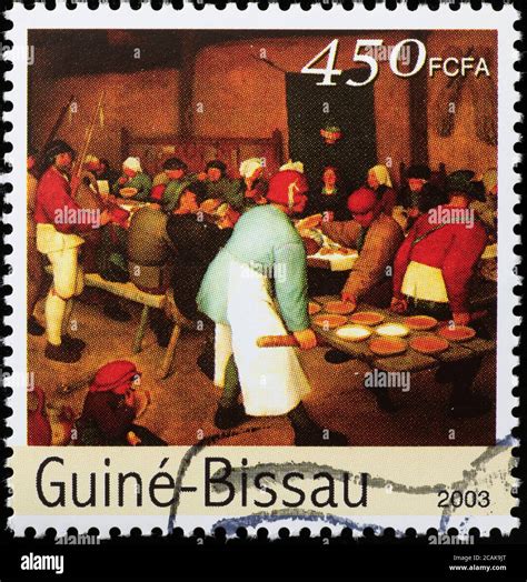 The Peasant Wedding by Bruegel the elder on stamp Stock Photo - Alamy