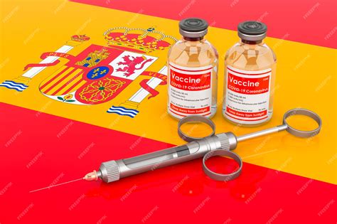 Vaccination in spain concept vaccine bottles with syringe on the ...