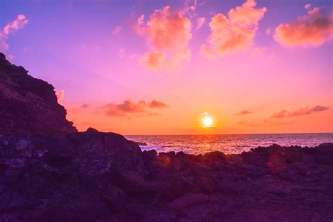 Download Hawaiian Pink And Orange Sunset Pictures | Wallpapers.com