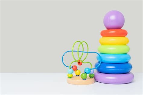 A set of childrens educational toys on a gray background a colored ...